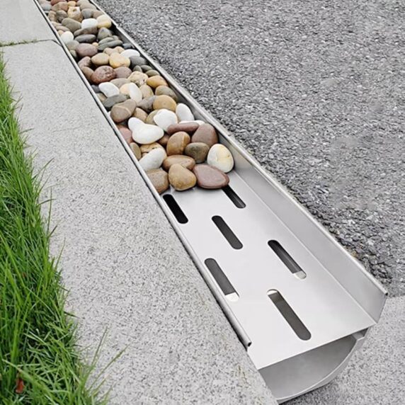 Drain duct with river rocks